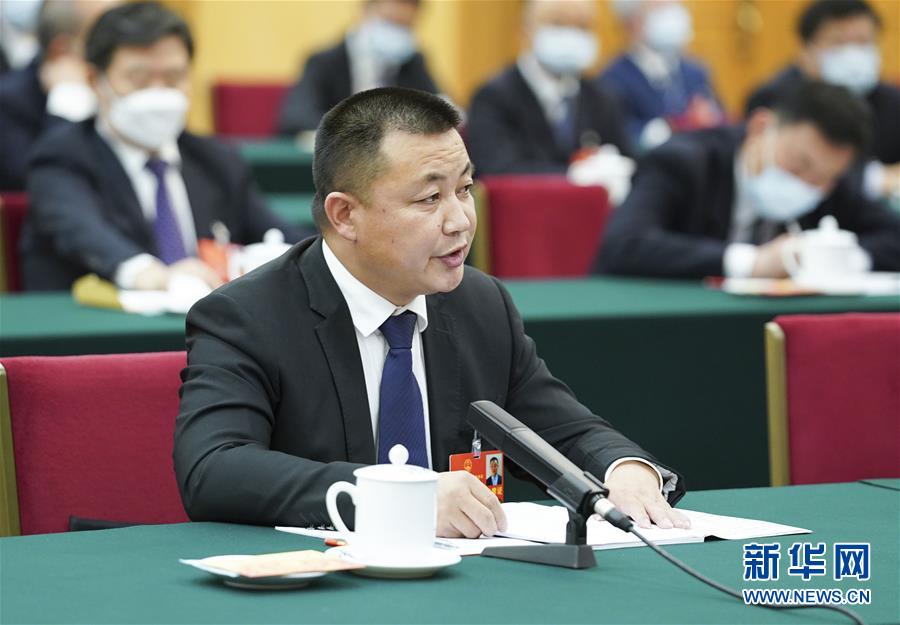 （新華全媒頭條·圖文互動）（11）從人民中汲取磅礴力量——習近平總書記同出席2020年全國兩會人大代表、政協(xié)委員共商國是紀實